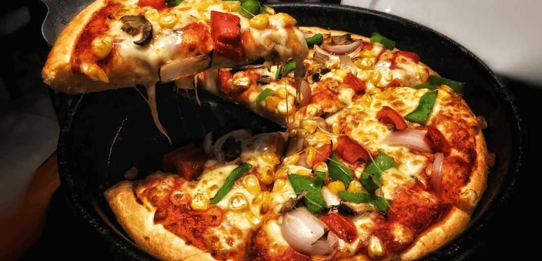Paneer Tikka Pizza + Soft Drink